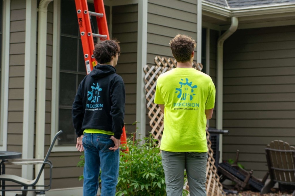 Precision Exterior Cleaning crew on-site at a residential property